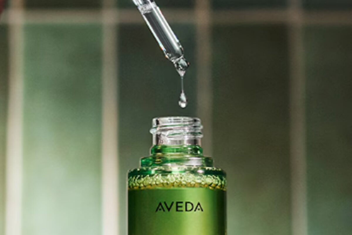 Close-up of Aveda nourishing oil and glass dropper applicator